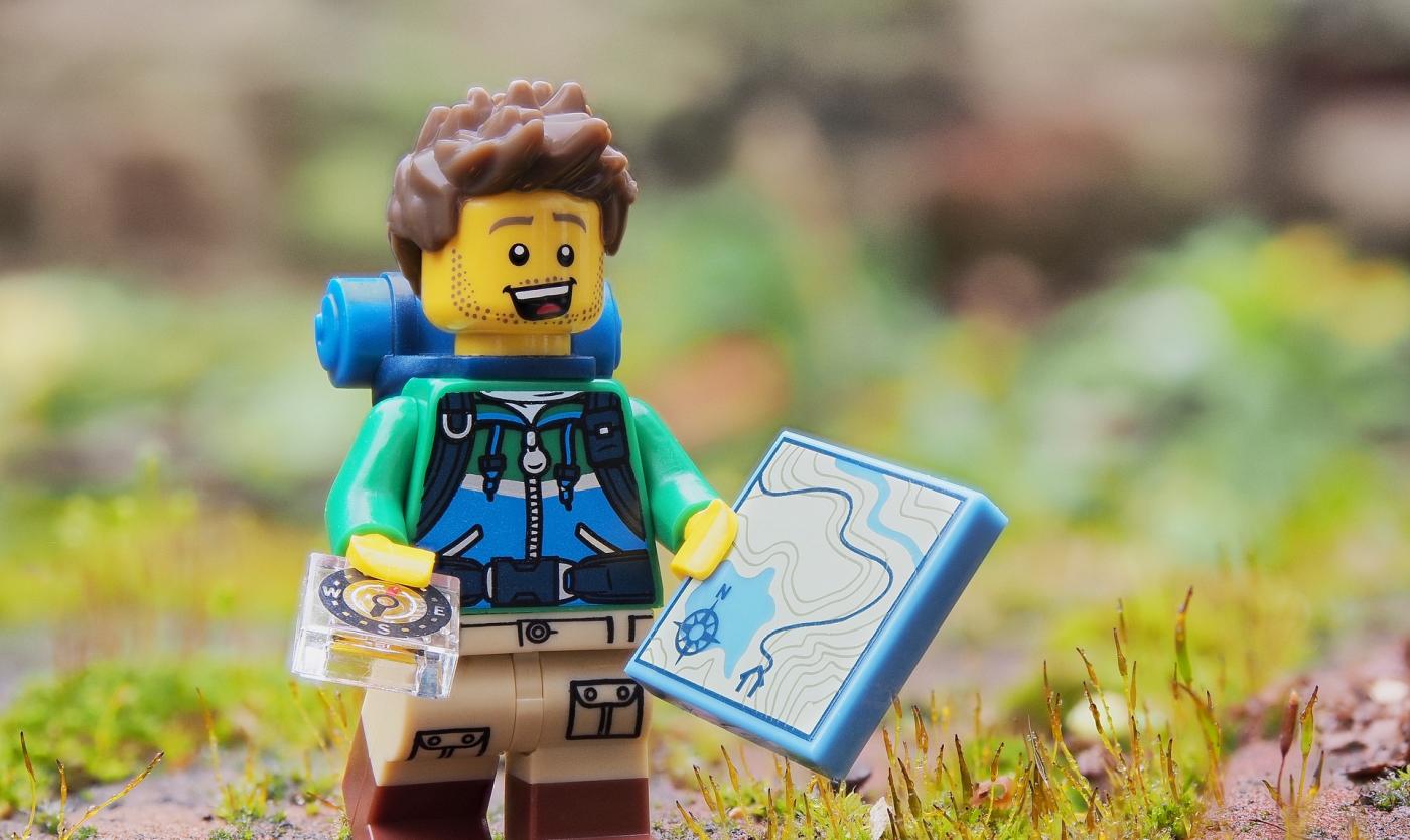 lego hiker with map