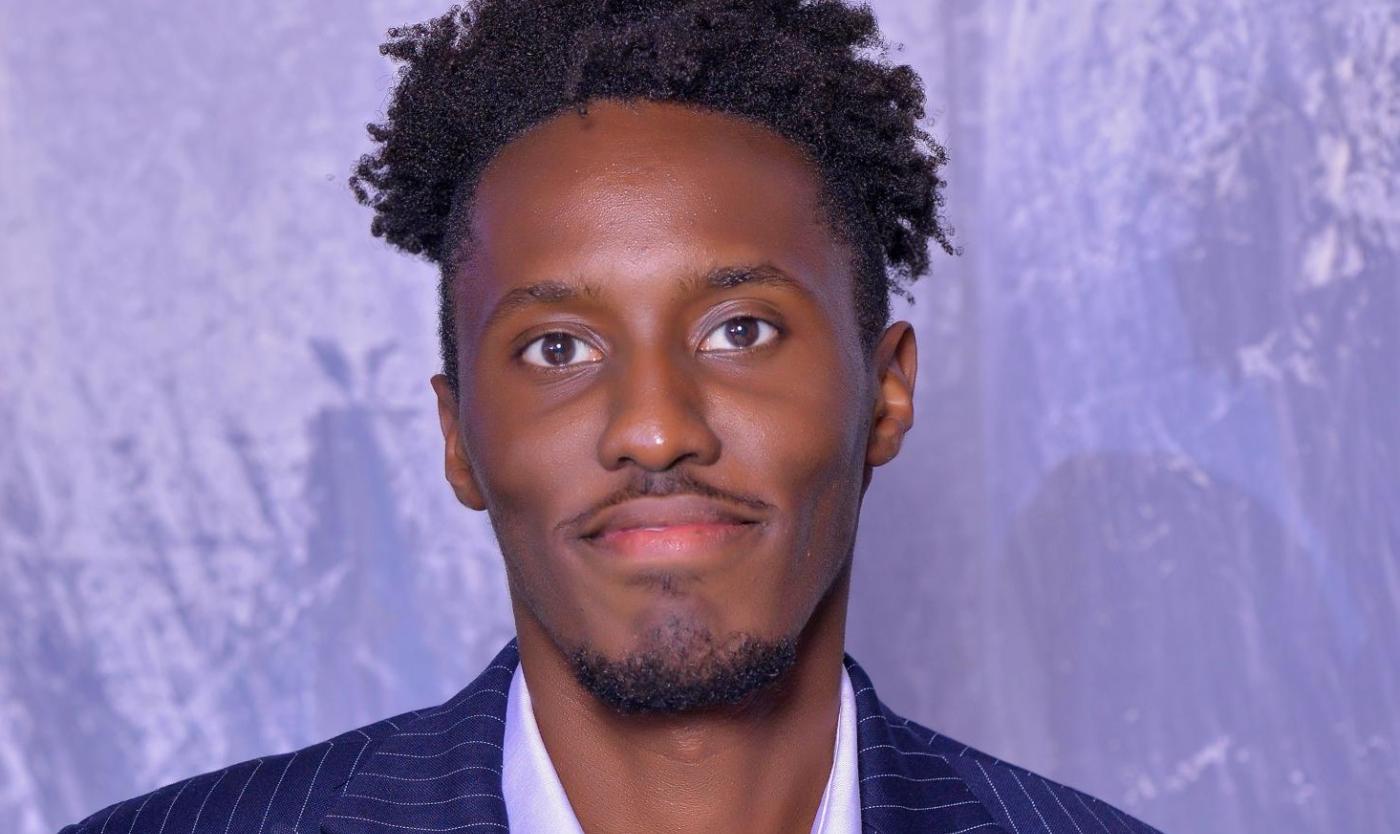 Portret van Derrick Muheki