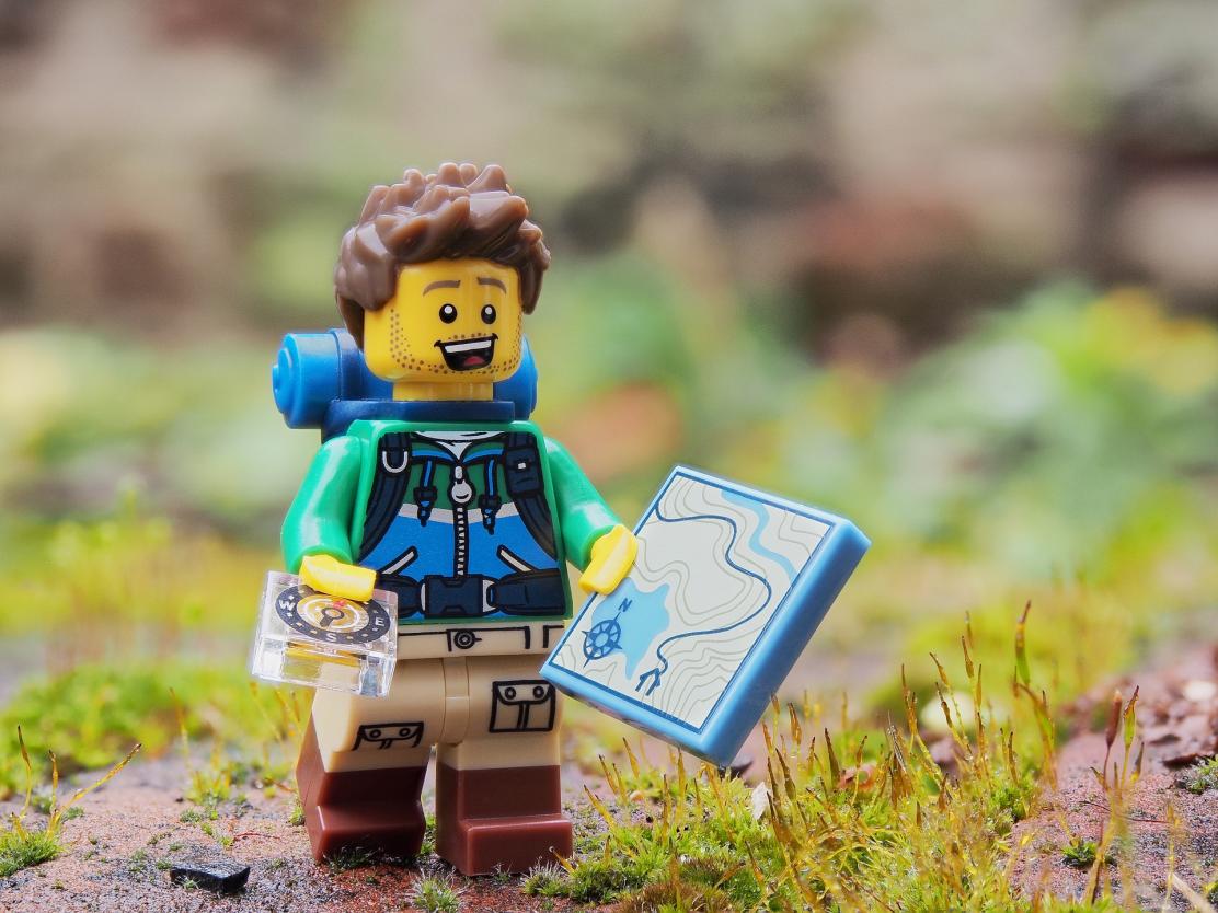 lego hiker with map