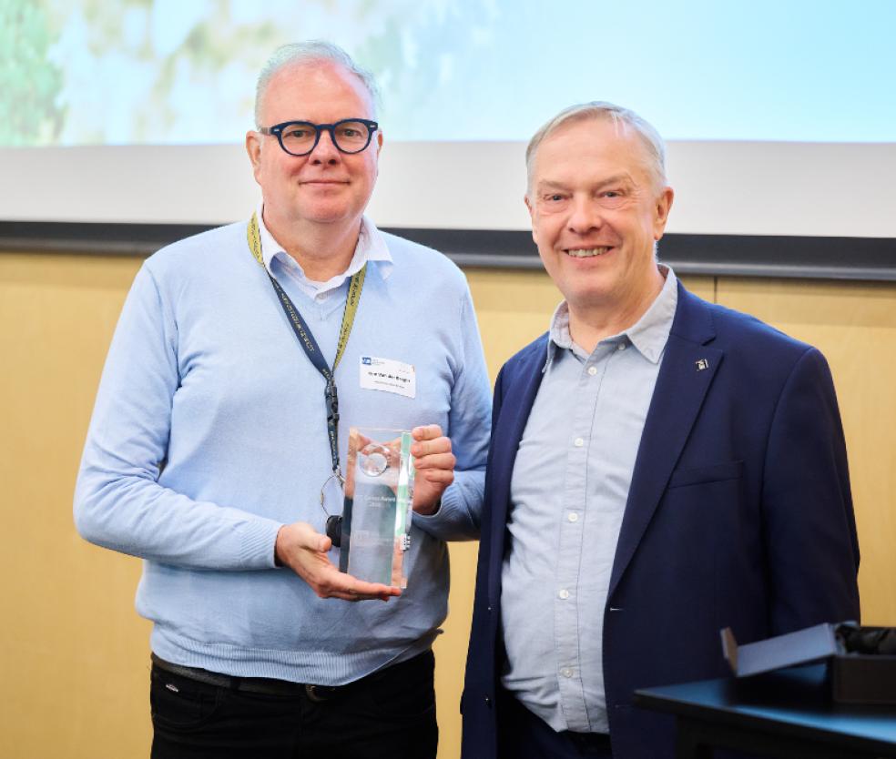 Professor Kim Van der Borght with the rector